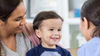 Toddler at the doc with his mom