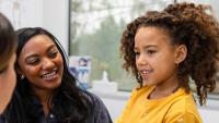 Young patient with her mother at the doctor's.