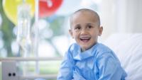 smiling pediatric cancer patient