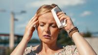 Woman experiencing hort flash in summer weather.