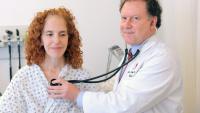 Cardiologist checks patient with heart defect