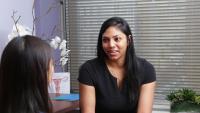 Gynecologist consults with female patient