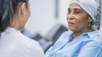 cancer patient is consulting her doctor
