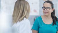 doctor consulting female patient