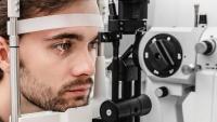 Patient undergoes eye test on a slit lamp