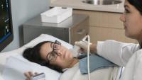 Columbia radiologist performs ultrasound test on patient.