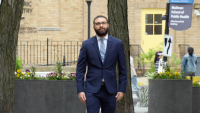 Dr. John Filtes, a chief resident in the Integrated Diagnostic and Interventional Radiology Residency program at Columbia, walking on the CUIMC campus.