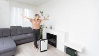 woman in her home with air purifier