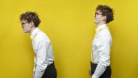 Man slouches while his twin stands with good posture.