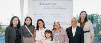 group of columbia doctors with patient's family