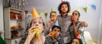 older adult celebrating new year with her family