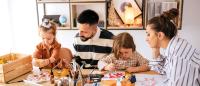 parents doing arts and crafts with kids