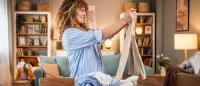 curly haired woman decluttering her home